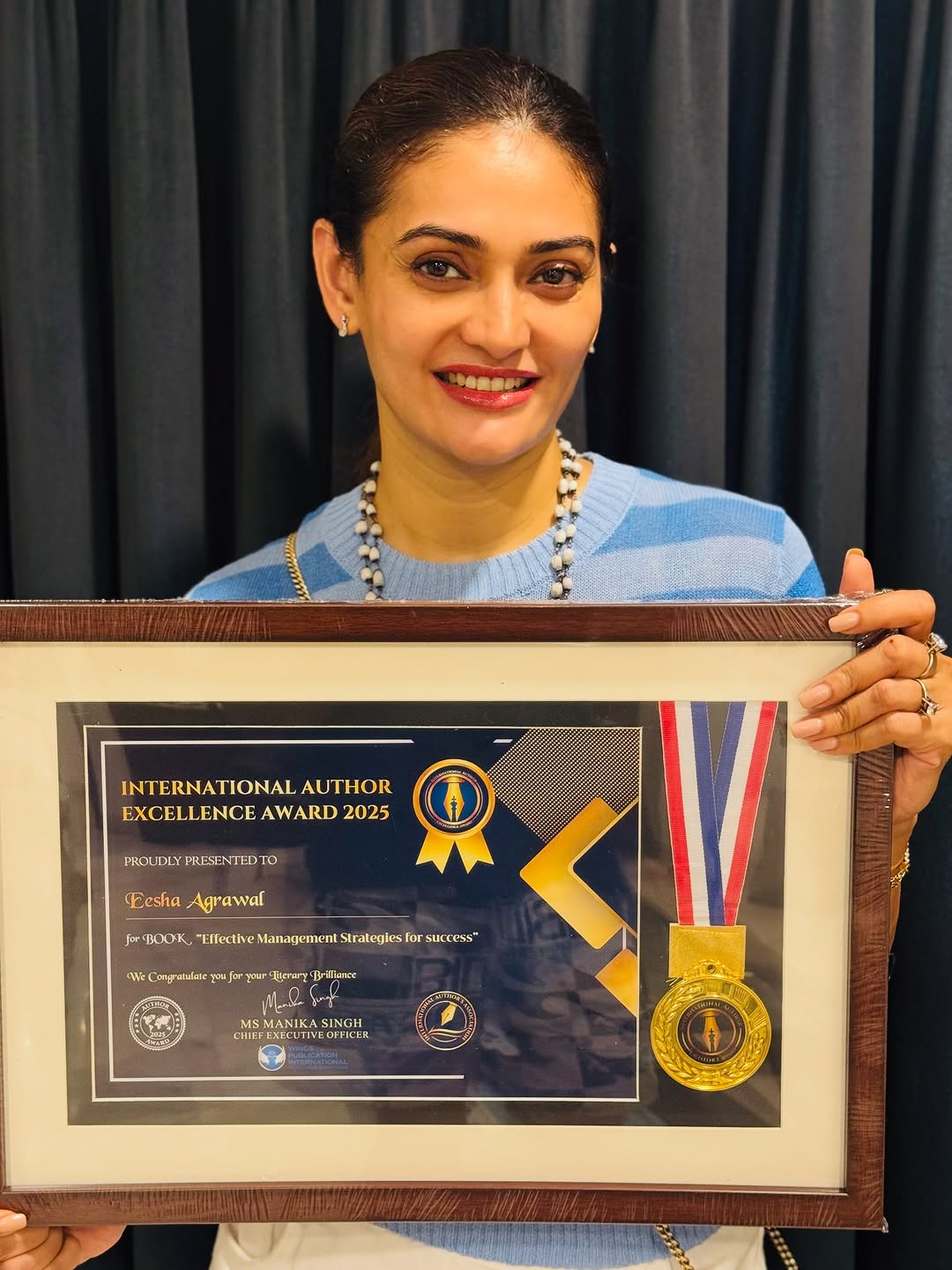 Receiving the International Author Excellence Award